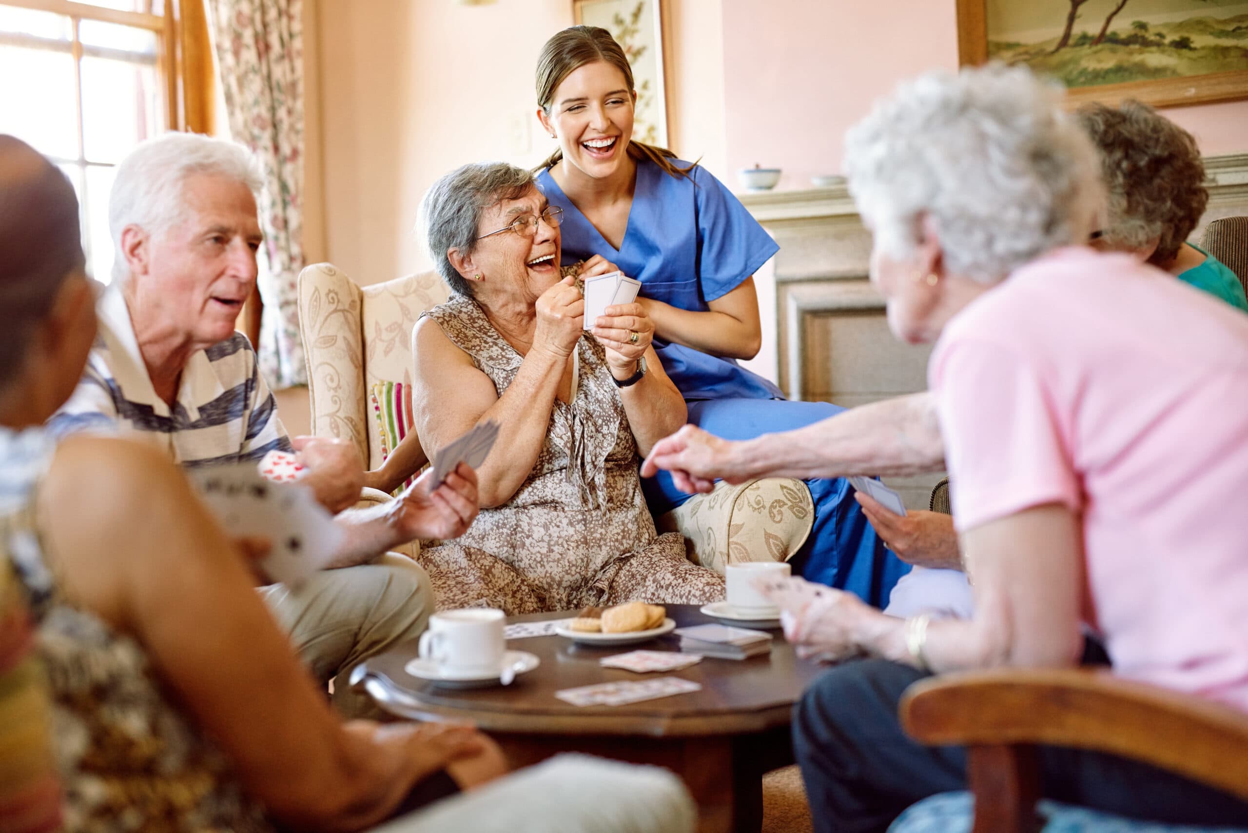 Group of seniors playing a card game