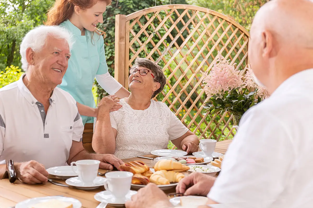 Seniors enjoying nutritious meals and snacks together at an adult daycare program