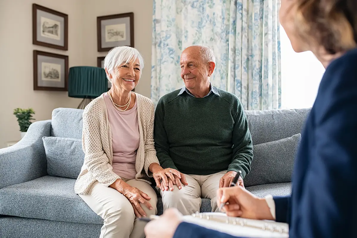 Healthcare provider discussing personalized cardiac care plans with an elderly patient