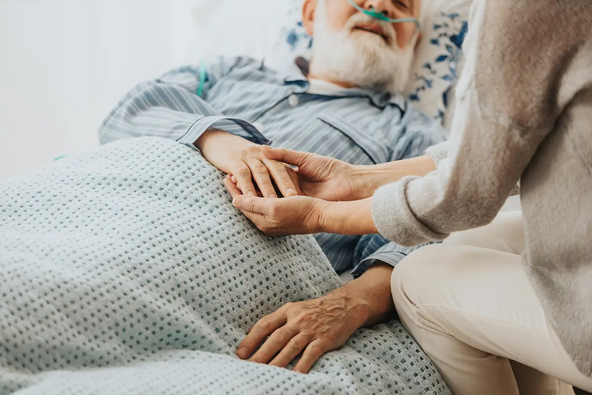 Healthcare provider offering compassionate hospice care to an elderly patient