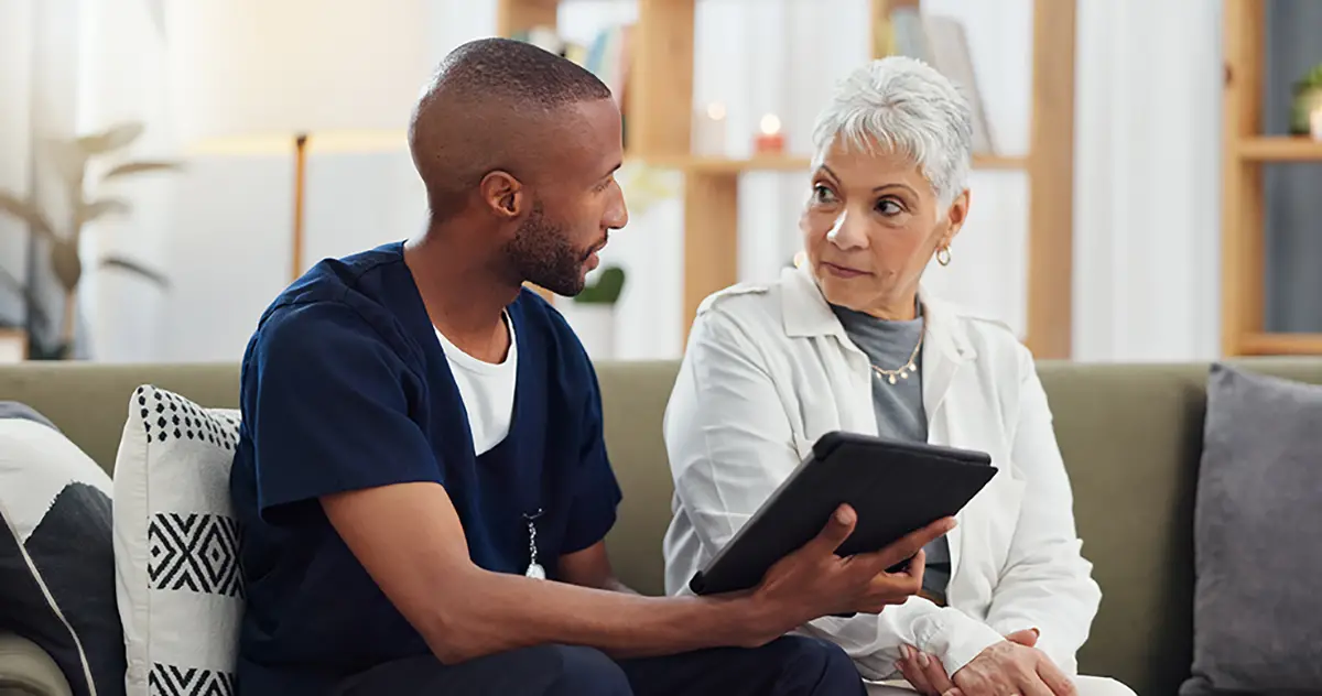 Healthcare provider coordinating nutrition care with an elderly patient