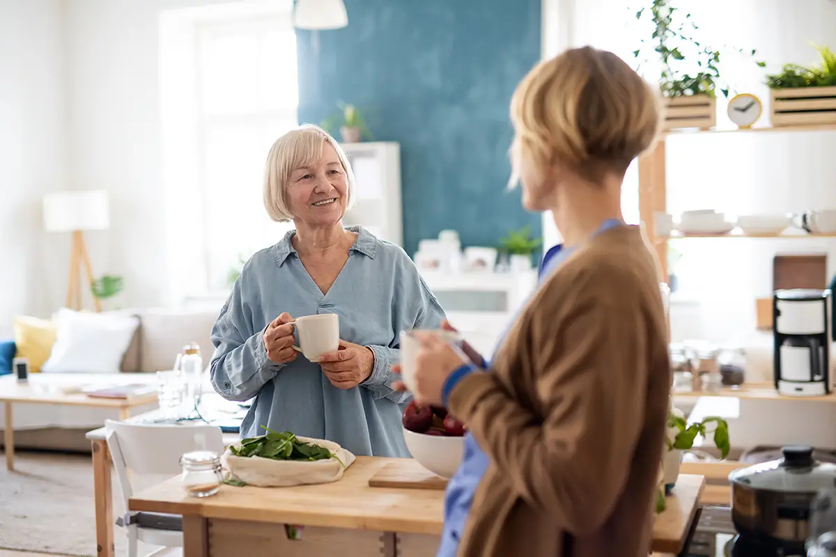 Nurse providing short-term respite care to an elderly patient