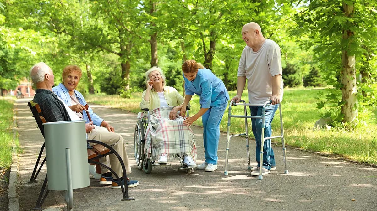 Seniors enjoying social and recreational outdoor activities during respite care